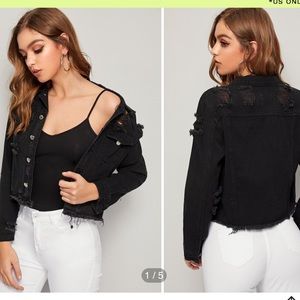 Distressed denim jacket